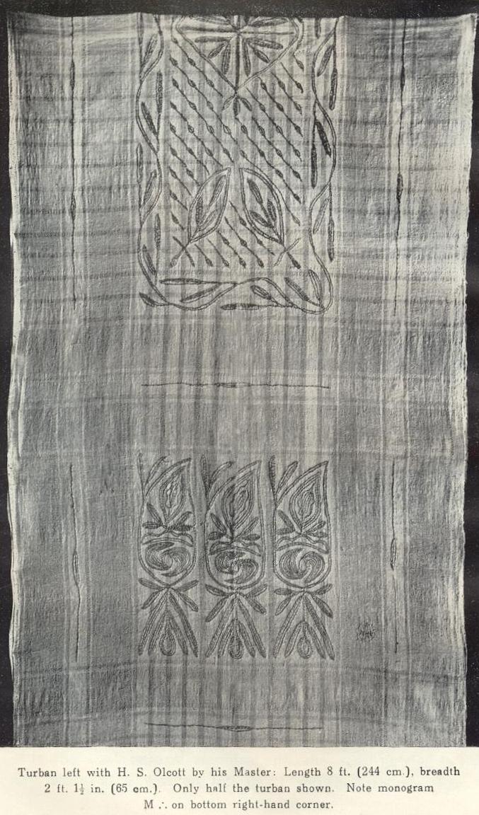 Morya's turban described by Henry Olcott as ". . . a head cloth or turban of amber-striped fabric, hand-embroidered in yellow floss silk. . . ."  Click on turban to see another "view" of fabric